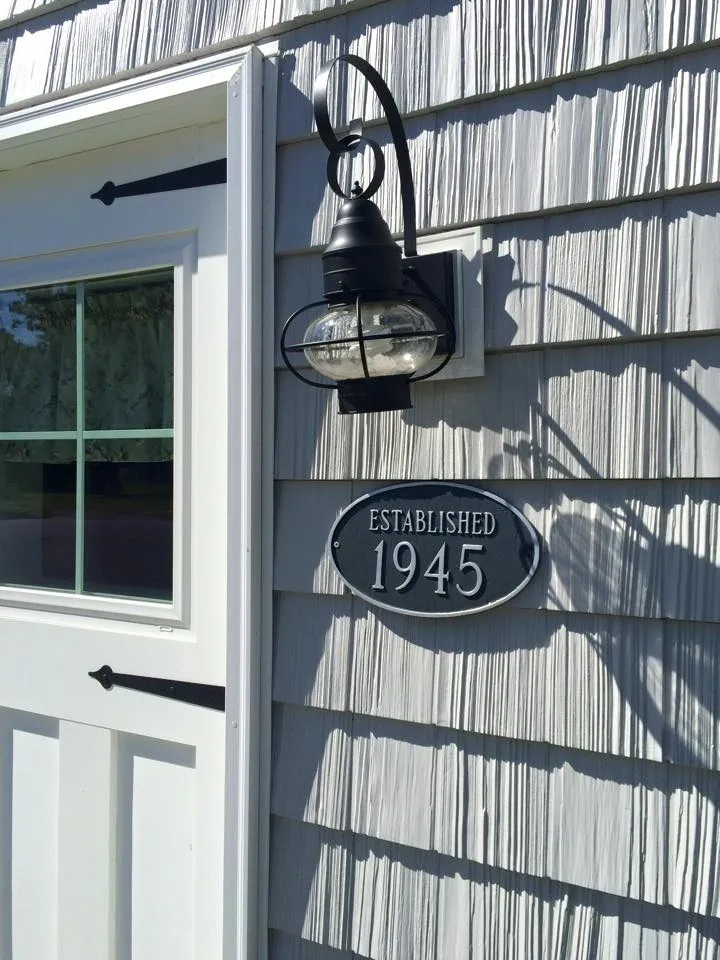 Cottage wall with vintage lantern