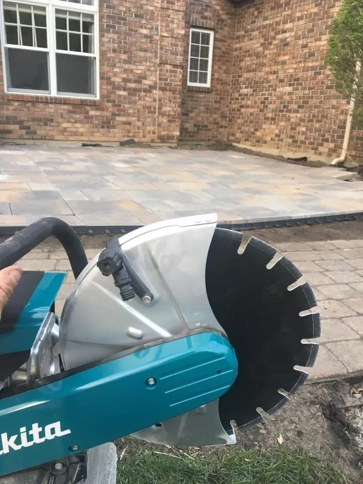 Circular saw with brick background
